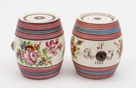 A pair of Bristol creamware spirit barrels: decorated in the manner of William Fifield with floral