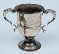 A George III silver two handled cup: maker WC possibly William Cattell, London, 1777: monogrammed,