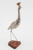 A 20th century Spanish silver model of a hoopoe: with raised crest,  on a polished wood plinth,