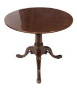 A George II mahogany circular tea table:,