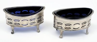 A pair of Edwardian pierced oval silver salts, maker George Nathan & Ridley Hayes, Chester 1907:,