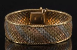 A 9ct gold, three colour mesh-link bracelet:, approximately 37gms gross weight.