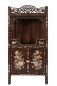 A Chinese carved wood and mother of pearl decorated hanging cabinet:,