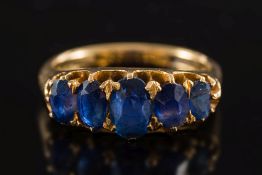 A 19th century gold and sapphire five-stone ring: with graduated oval sapphires in claw setting,