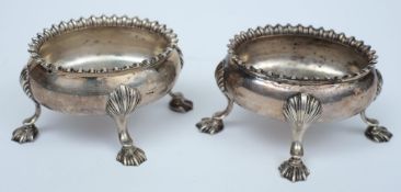 A matched pair of Georgian silver oval table salts:, one maker Crispin Fuller or Charles Fox I,