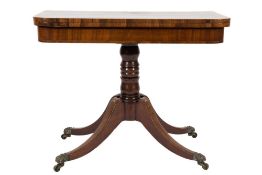 A Regency mahogany, rosewood crossbanded and inlaid card table:, bordered with boxwood lines,