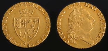 A George III spade guinea:.