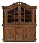 An 18th Century Flemish carved oak display cabinet:, of large size,