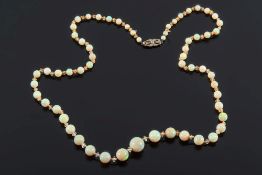A graduated opal and faceted crystal bead single-string necklace: with opal beads graduated from 4.