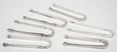 A pair of 19th century silver sugar tongs, maker I.C:  of plain form 13cm.