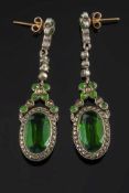 A pair of green paste and marcasite drop earrings: each with an oval green paste and marcasite drop,