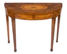 A late 18th Century Dutch Gonzalo Alves and marquetry inlaid card table:, of D shaped outline,