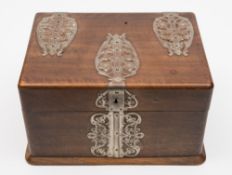 An early 20th century games compendium: the mahogany case with plated scrolling mounts with hinged