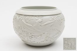 A Chinese white glazed porcelain bowl: of ovoid form,