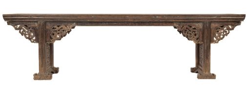A 19th Century Chinese carved hardwood altar table:, with a rectangular moulded top,
