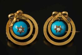 A pair of late 19th century enamelled gold and seed-pearl circular brooches:,