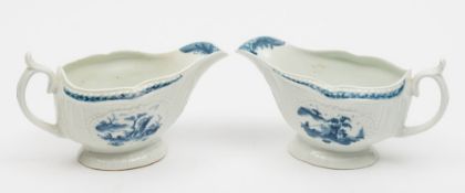 A pair of Worcester First Period porcelain sauceboats: of press moulded form with panelled fluted
