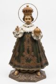 A large carved wood and polychrome decorated figure Child of Prague: with wire halo,