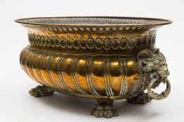 A 19th century Dutch brass wine cooler: of oval lobed form,