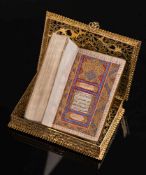 KORAN : illuminated manuscript in filigree gold box - leather backed floral covers, 89 x 57 mm,  A.
