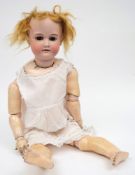 An Armand Marseille bisque head doll: impressed A.15.M.