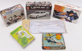 A Dinky Sea King helicopter (724) with remains of original blister packaging together with five