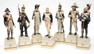 A group of seven Continental porcelain Napoleonic style military figures;