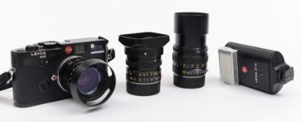 A Leica M6 Rangefinder TTL Film Camera in black with manual, and lenses, a 28mm F2.