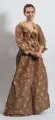 A Victorian brown silk and embroidered bodice and skirt:, with lace collar and cuffs,