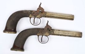 A pair of 19th Century boxlock percussion pistols:, the 8.