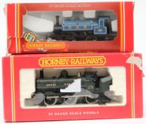 A Hornby GWR 0-6-0PT locomotive, together with a Caledonian 0-4-0 saddle tank locomotive,