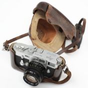A Leica M3 35mm camera with Summilux 50mm 1.