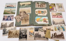 An early 20th century postcard album containing WWI,