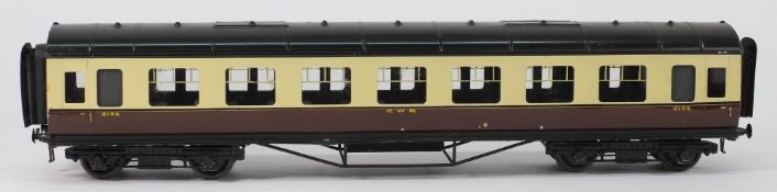 Exley, a  passenger corridor coach:, in GWR cream and brown livery.