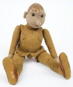 A WWI period felt doll of a British soldier:, unsigned, boot button eyes,