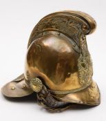An Edwardian brass Merryweather pattern fireman's helmet:,