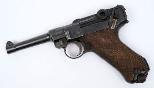 A de-activated Luger 9mm automatic pistol by DWM:, no 9555, the chamber dated 1917,