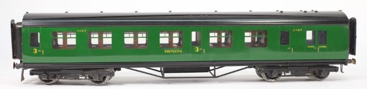 Exley, a 3rd/brake passenger corridor coach:, in Southern green livery.