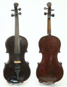 A late 19th century violin in the style of Nicholas Amati: the two piece back of narrow flame and