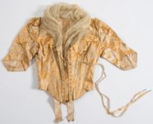 A Victorian cream silk and lace bodice retailed by 'Mdme Oliver Holmes, Regent Street, London,
