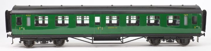 Exley, a 1st class passenger corridor coach:, in Southern green livery.