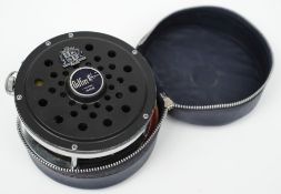 A Gilfin  model 455 heavy duty salmon reel with line and pouch:, single handle and line tensioner,
