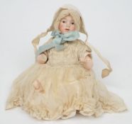 A Heubach bisque doll: impressed Heubach. 8004.Germany.