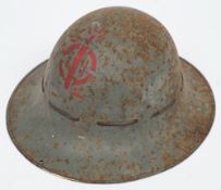 A World War II Fire Warden's steel helmet: painted grey with red stencilled logo, with liner,