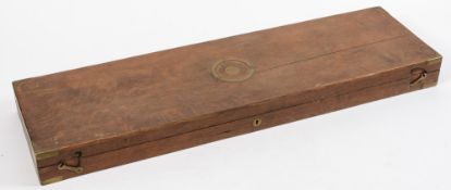 An oak and brass mounted gun case:, interior  incomplete, 88cm long.
