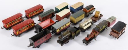 A quantity of assorted O gauge locomotives and rolling stock;