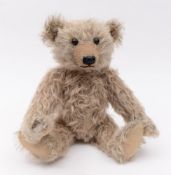 A  late 20th century Steiff grey plush bear with growler:, black eyes ,