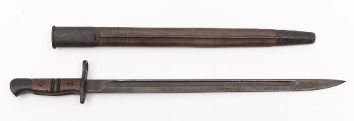 A Remington 1913 bayonet: in leather scabbard with metal mounts.