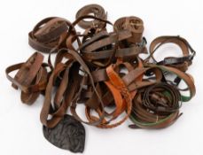 A pair of Post-War German black leather braces together with a collection of various leather belts