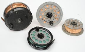 A Beaulite Shakespeare salmon reel with spare spools and lines together with a Pridex trout reel